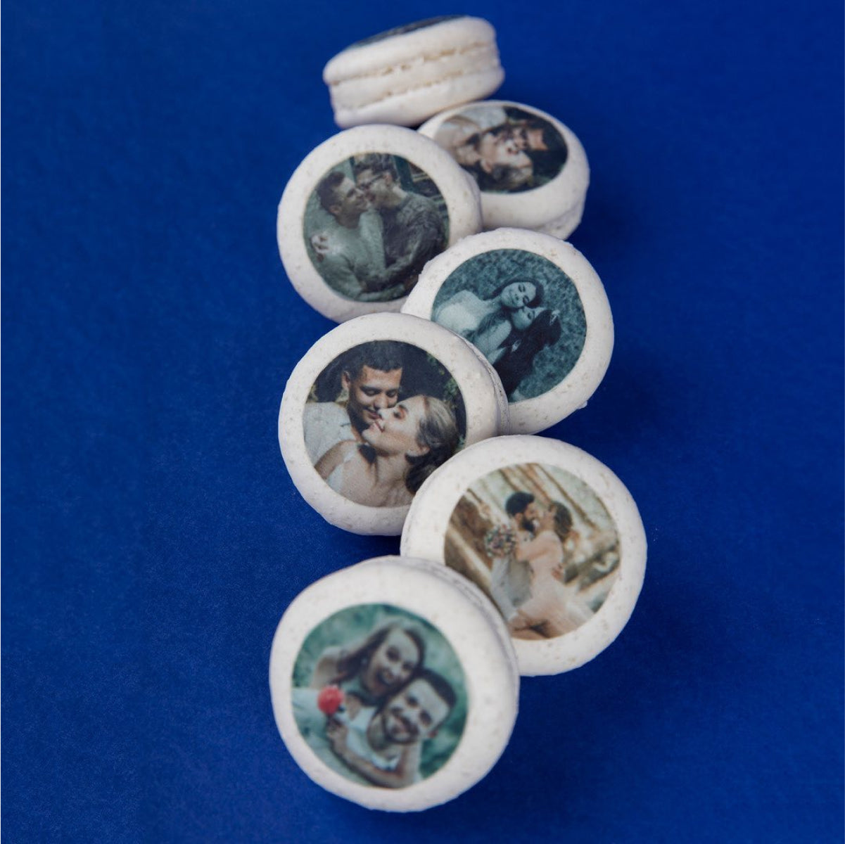 Various personalised macarons featuring happy married couples printed on